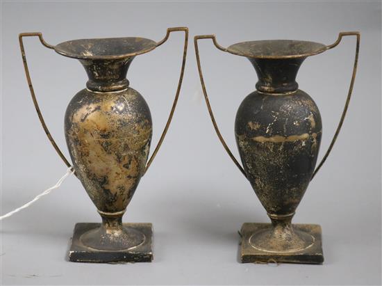 A pair of Edwardian silver two handled vases, A & J Zimmerman, Birmingham 1904, 13.5cm.